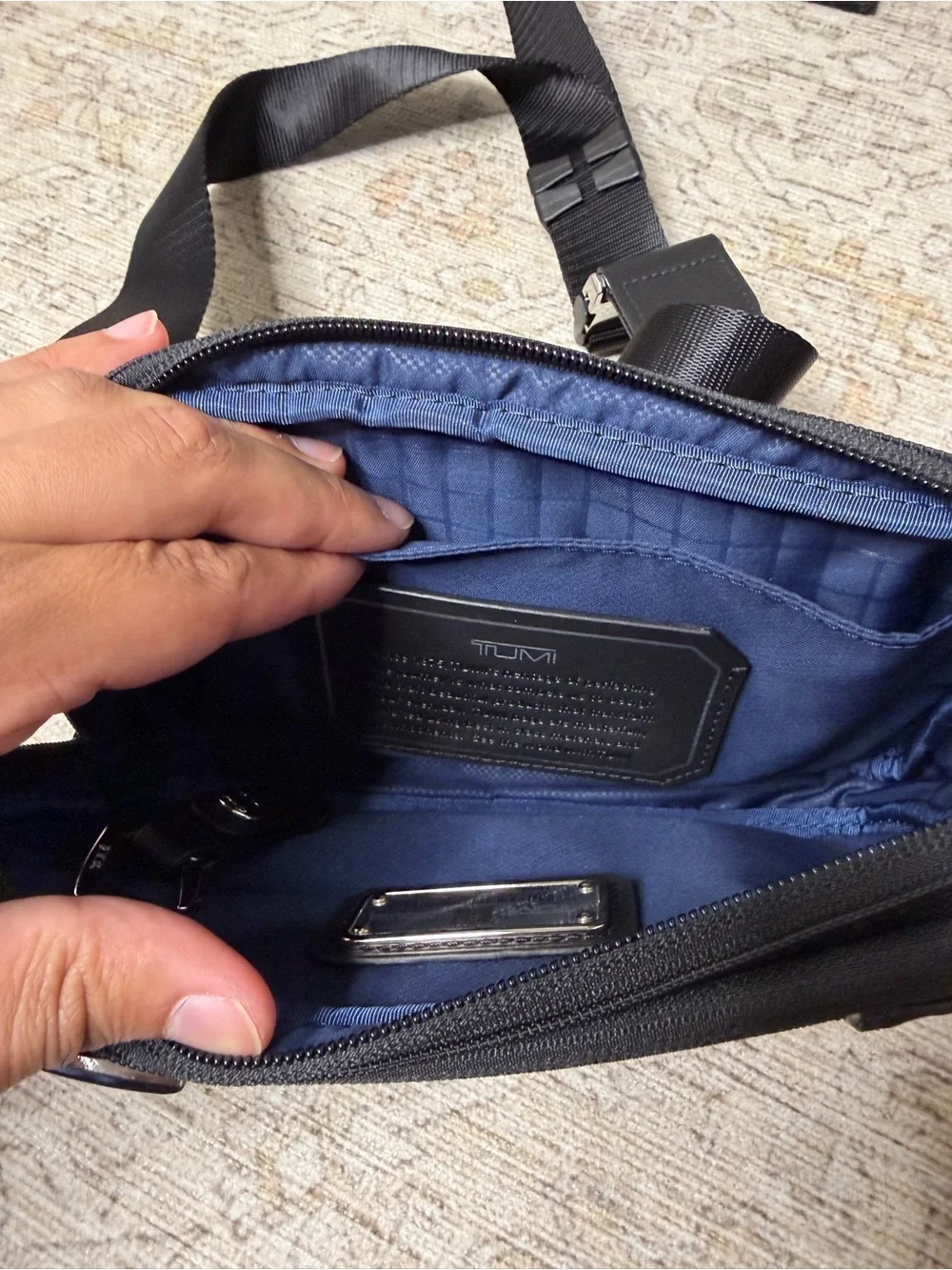 Tumi Black Men's Sling Belt Bag with Silver Accents